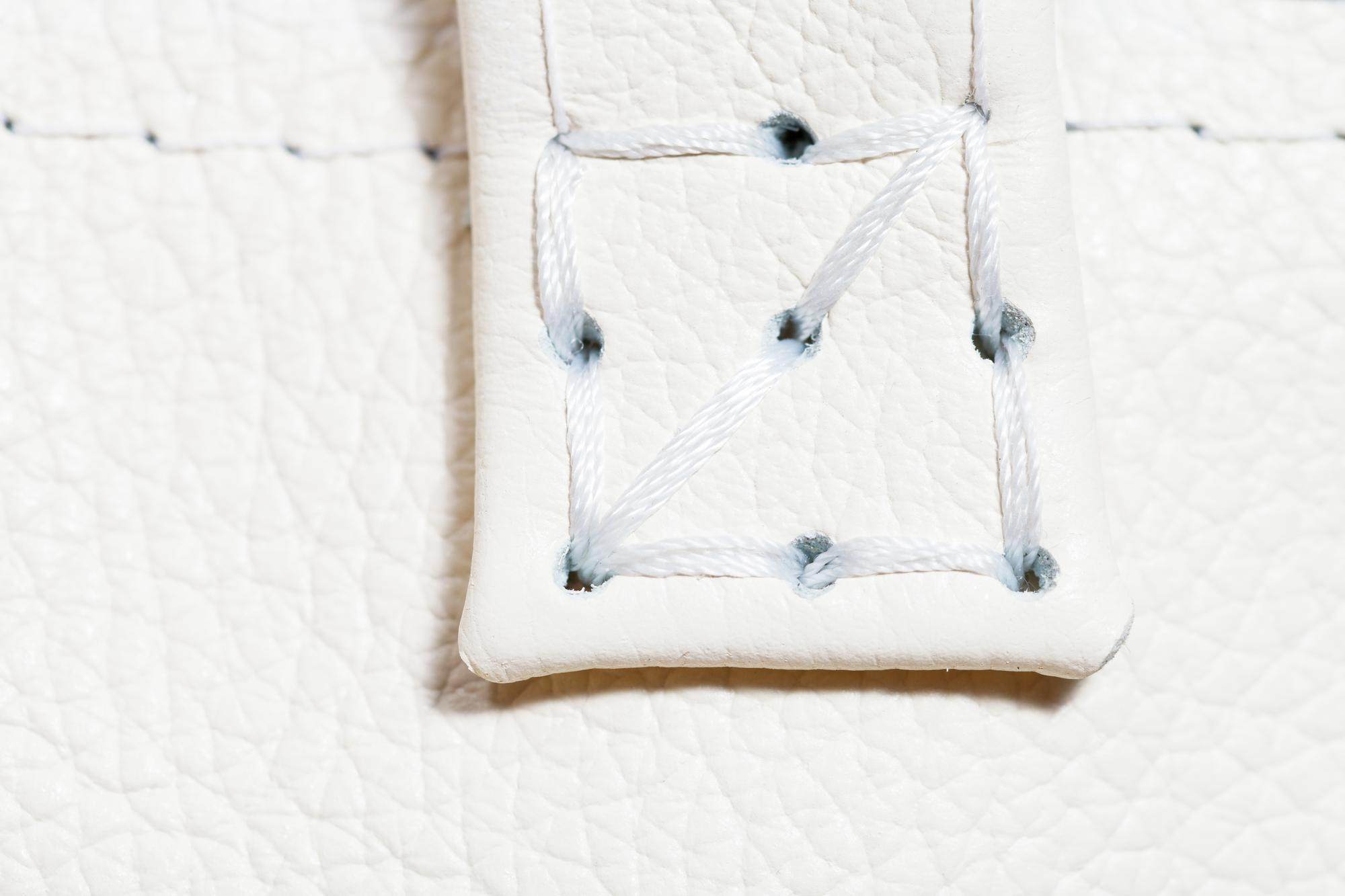 Close-up of contemporary embroidered patch on fabric